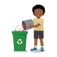 cute little African boy taking out the trash into recycling bin doing daily routine housework chores at home vector