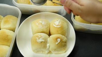 milk bun making processes, homemade bakery preparation concept, fresh dough ball with cream cooking product video