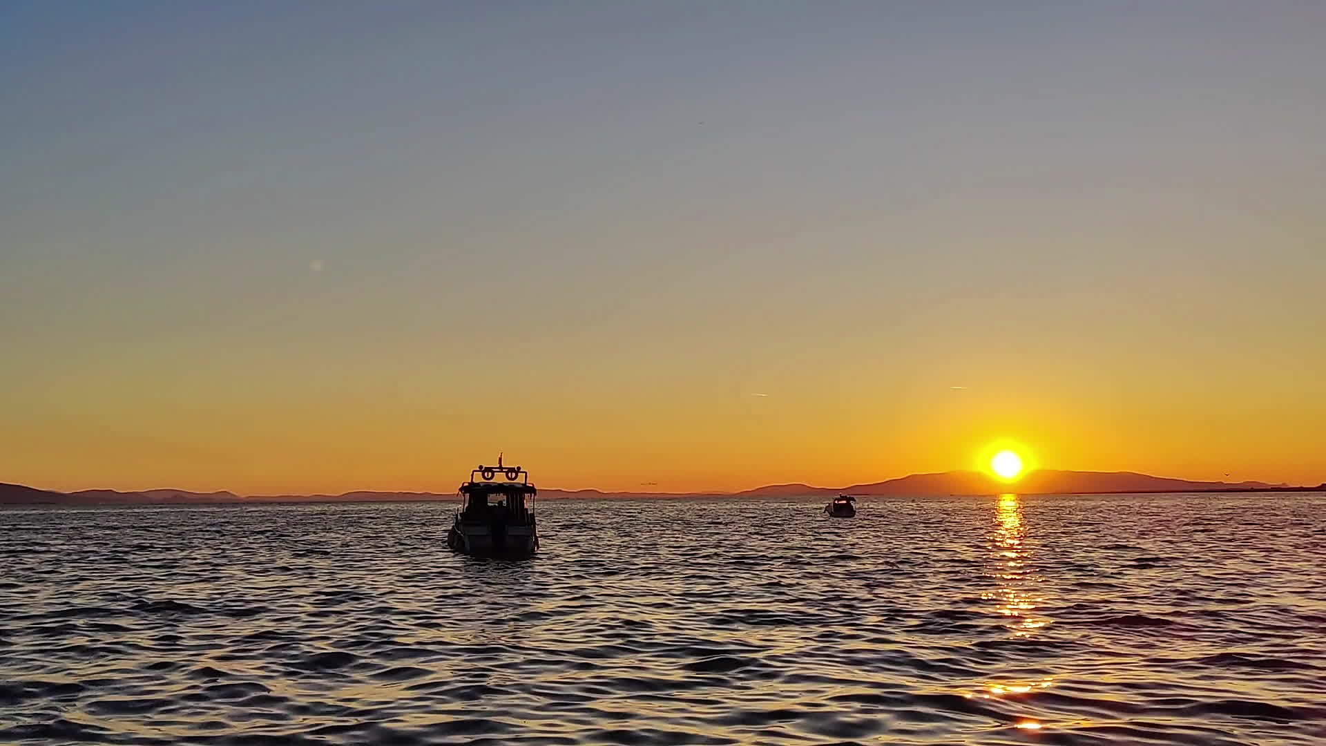 Yellow Sea Sunset Recreational Boat 23063869 Stock Video at Vecteezy