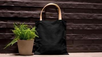 , Realistic black tote canvas fabric bag set-up in at interior or outdoor, shopper mock up blank. photo