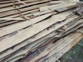 Boards cut into firewood for home heating photo