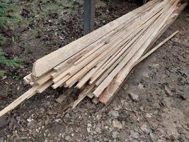 Boards cut into firewood for home heating photo