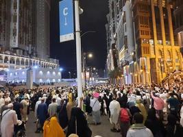 Mecca, Saudi Arabia, April 2023 - Pilgrims from all over the world gather around Masjid al-Haram on the twenty-ninth night of Ramadan in Makkah. photo