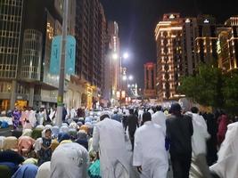 Mecca, Saudi Arabia, April 2023 - Pilgrims from all over the world gather around Masjid al-Haram on the twenty-ninth night of Ramadan in Makkah. photo