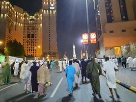 Mecca, Saudi Arabia, April 2023 - Pilgrims from all over the world gather around Masjid al-Haram on the twenty-ninth night of Ramadan in Makkah. photo