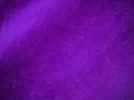 Purple velvet fabric texture used as background. Luxury violet fabric background of soft and smooth textile material. There is space for text. photo