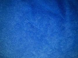 Blue velvet fabric texture used as background. Empty blue fabric background of soft and smooth textile material. There is space for text. photo