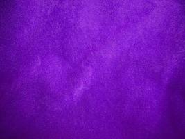 Purple velvet fabric texture used as background. Luxury violet fabric background of soft and smooth textile material. There is space for text. photo