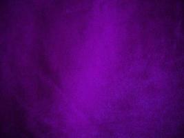 Purple velvet fabric texture used as background. Luxury violet fabric background of soft and smooth textile material. There is space for text. photo