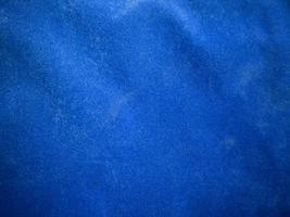 Blue velvet fabric texture used as background. Empty blue fabric background of soft and smooth textile material. There is space for text. photo