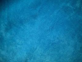 Blue velvet fabric texture used as background. Empty blue fabric background of soft and smooth textile material. There is space for text. photo