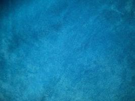 Blue velvet fabric texture used as background. Empty blue fabric background of soft and smooth textile material. There is space for text. photo