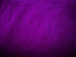 Purple velvet fabric texture used as background. Luxury violet fabric background of soft and smooth textile material. There is space for text. photo