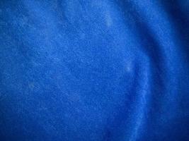 Blue velvet fabric texture used as background. Empty blue fabric background of soft and smooth textile material. There is space for text. photo