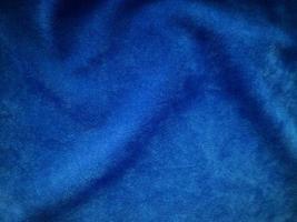 Blue velvet fabric texture used as background. Empty blue fabric background of soft and smooth textile material. There is space for text. photo