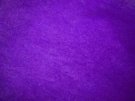 Purple velvet fabric texture used as background. Luxury violet fabric background of soft and smooth textile material. There is space for text. photo