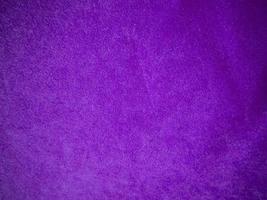 Purple velvet fabric texture used as background. Luxury violet fabric background of soft and smooth textile material. There is space for text. photo