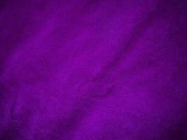 Purple velvet fabric texture used as background. Luxury violet fabric background of soft and smooth textile material. There is space for text. photo