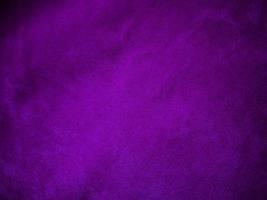 Purple velvet fabric texture used as background. Luxury violet fabric background of soft and smooth textile material. There is space for text. photo