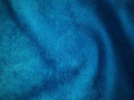 Blue velvet fabric texture used as background. Empty blue fabric background of soft and smooth textile material. There is space for text. photo