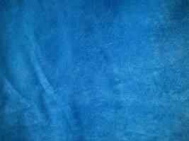 Blue velvet fabric texture used as background. Empty blue fabric background of soft and smooth textile material. There is space for text. photo