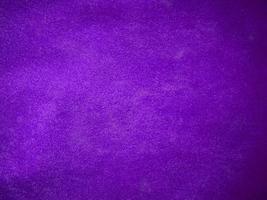 Purple velvet fabric texture used as background. Luxury violet fabric background of soft and smooth textile material. There is space for text. photo