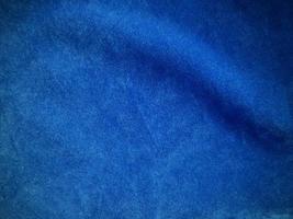 Blue velvet fabric texture used as background. Empty blue fabric background of soft and smooth textile material. There is space for text. photo