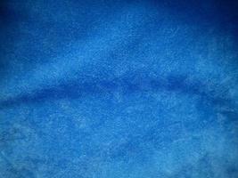 Blue velvet fabric texture used as background. Empty blue fabric background of soft and smooth textile material. There is space for text. photo