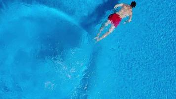 Topview from a drone over the surface of the pool video