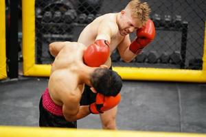 Muay Thai, The martial art of Thailand, Power punches into the face of the opponent. Able to defeat opponent by knockout. photo