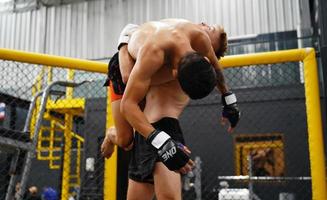 Mixed Martial Art, Lifting an opponent up and dropping them on the ground will cause the opponent to have colic, distension and may lose It is a kind of weapon of mixed martial arts. photo