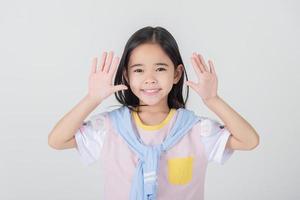 Image of Asian child posing on white  background photo