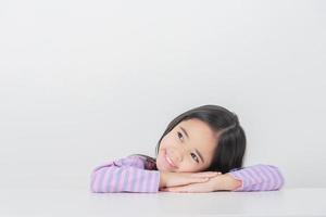 Image of Asian child posing on white  background photo