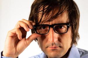 Man holding eyeglass photo