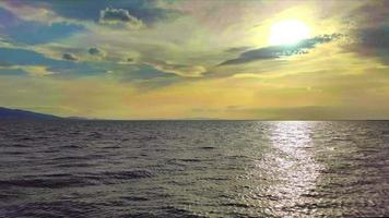 Sun Setting Reflection on Cloudy Seascape video