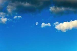 Clouds and moon photo