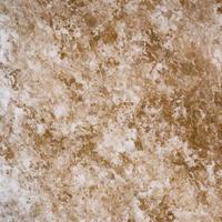 White and golden noisy grunge marble texture photo