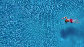 Topview from a drone over the surface of the pool video