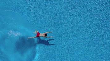 Topview from a drone over the surface of the pool video