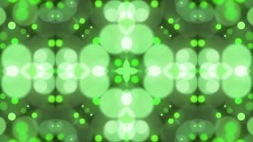 Green kaleidoscope bokeh shiny particle rain motion light luminance illustration night background, artistic space bokeh speed matrix magic effect background animation. video