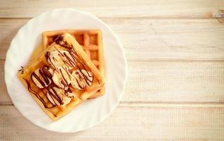 Waffles with banana and chcolate photo