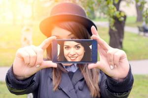 Female making selfie photo