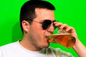 Man drinking beer photo