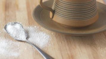 Sugar Substitute sweetener and tea cup on table video