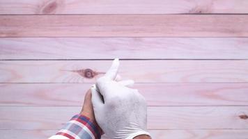 Closeup of doctor hands wearing protective gloves video