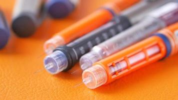 collection of Insulin pens on color background video