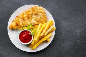 fish and chips french fries deep fried fast food  meal food snack on the table copy space food background rustic top view photo