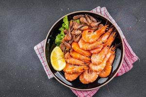 shrimp prawn fresh seafood plater meal food snack on the table copy space food background rustic top view photo