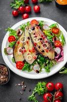 eggplant salad snack fried eggplant slices, green salad leaves healthy meal food on the table copy space food background rustic top view keto or paleo diet veggie vegan or vegetarian food photo