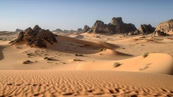 A desert with sand dunes and rock formations. photo